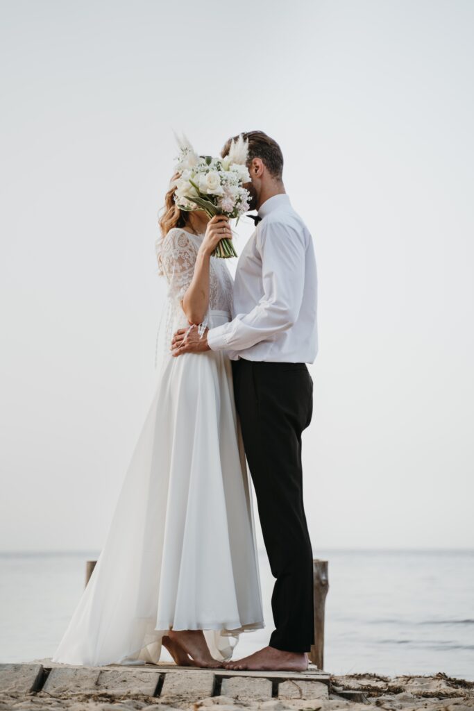 beautiful-couple-having-their-wedding-beach (1)